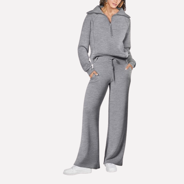 Woman wearing a comfortable 2-piece travel outfit, a stylish rayon blend set with wide leg pants for vacation.
