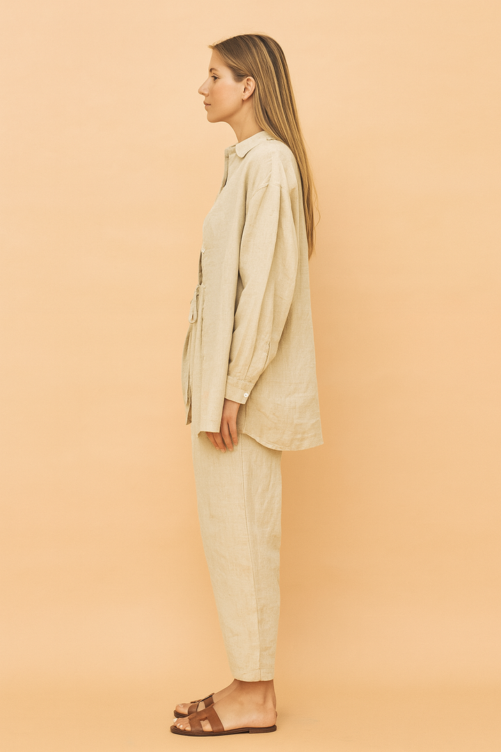 Stylish women's 3-piece beige loungewear set: versatile long-sleeve blouse, crop top, and comfy pants for everyday.