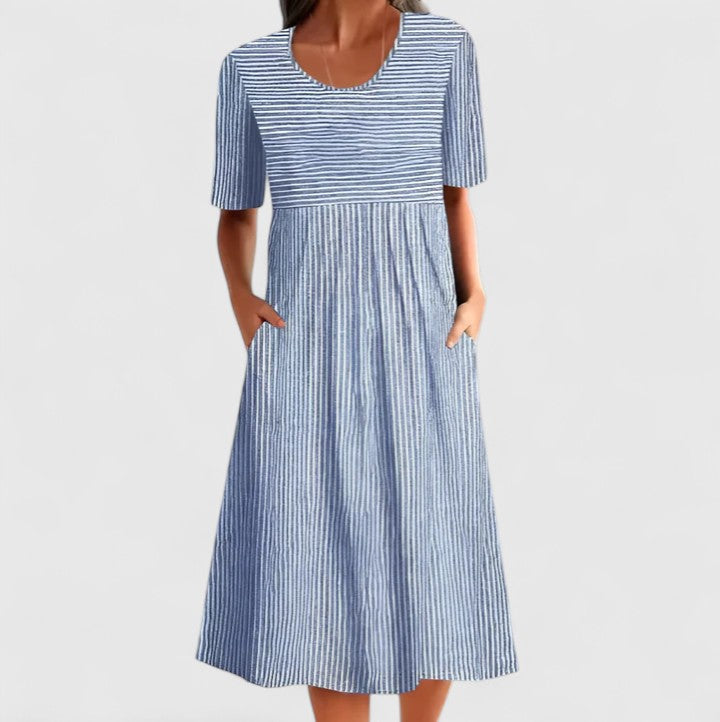 Comfortable women's blue & grey striped midi dress with buttons & pockets, perfect for casual summer everyday style.