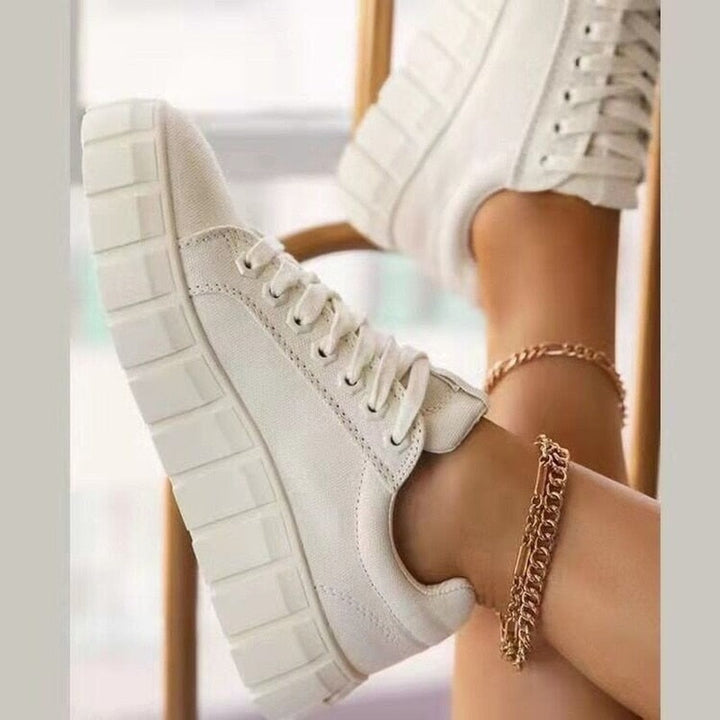 Soft & supportive women's walking sneakers. Low-top design for ultimate comfort & everyday casual footwear versatility.