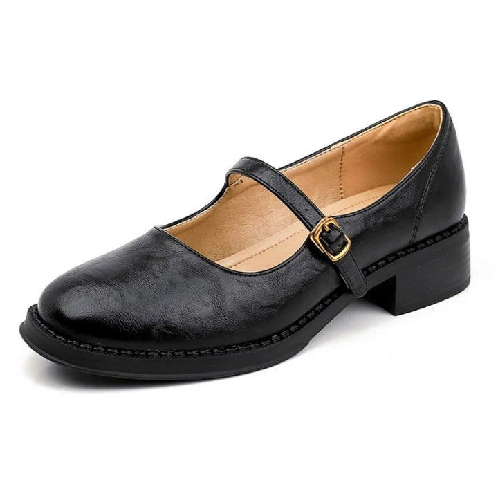 Women's comfortable Mary Jane flats with a low block heel, ideal versatile footwear for smart casual outfits.