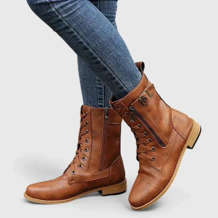 Durable women's walking boots featuring orthopedic arch support. Provides comfortable, supportive footwear for any day.