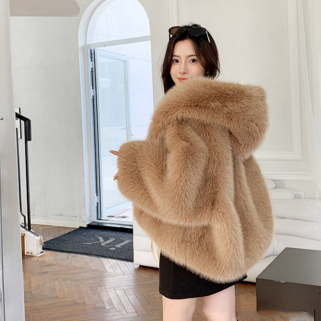 Cozy women's hooded long sleeve coat for comfortable fall & winter fashion. An elegant and stylish outerwear jacket.
