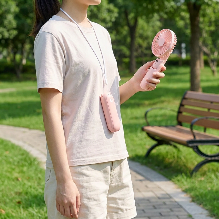 Compact 3-in-1 cooling fan, portable power bank & LED flashlight. Perfect for travel & outdoor use.