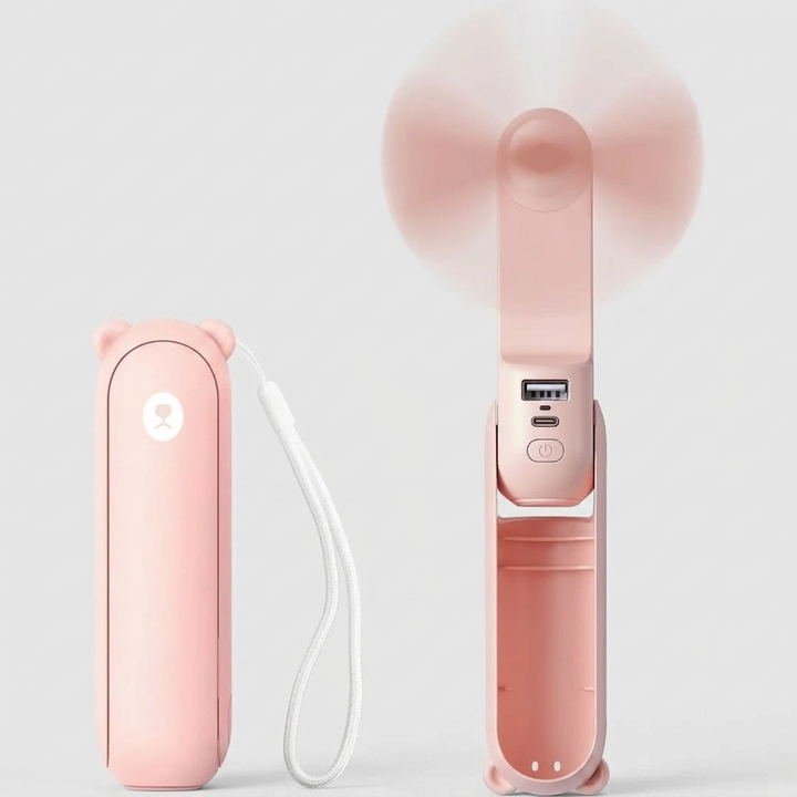 Unisex handheld mini fan for personal cooling. USB rechargeable, compact & lightweight for on-the-go comfort.
