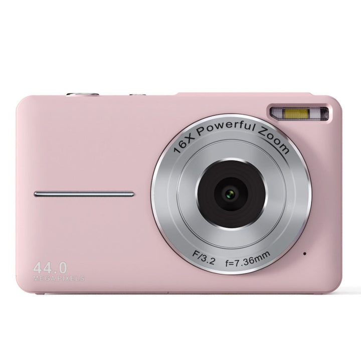 Teenager holding a compact 44MP digital camera, ideal for vlogging & travel, easy to use.