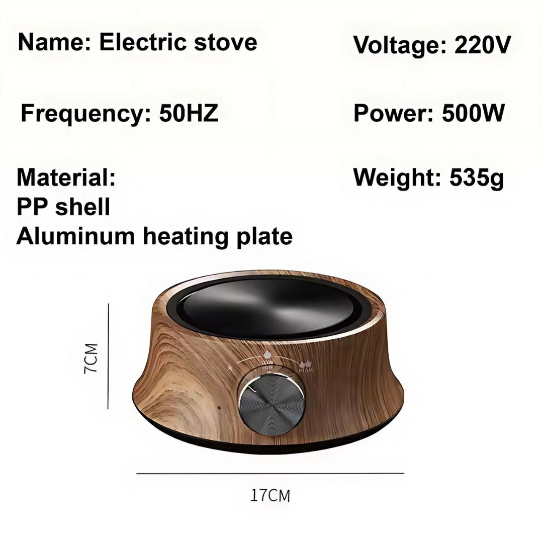 Close-up of the compact electric hot plate's temperature control dial for precise heat.