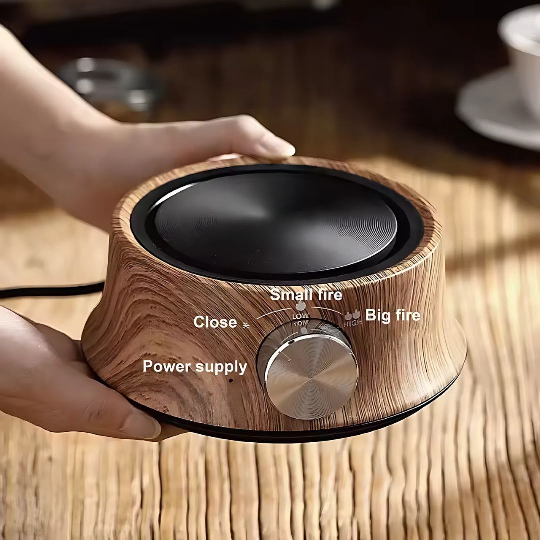 Small kitchen electric hot plate for cooking, simmering, and keeping food warm. Temp control.