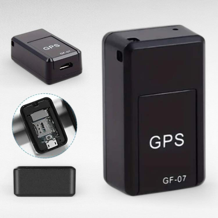 Close-up of a compact magnetic GPS tracker device for car security and real-time asset monitoring.