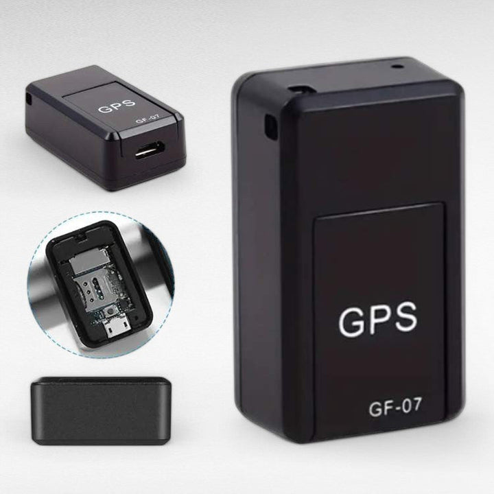 Close-up of a compact magnetic GPS tracker device for car security and real-time asset monitoring.