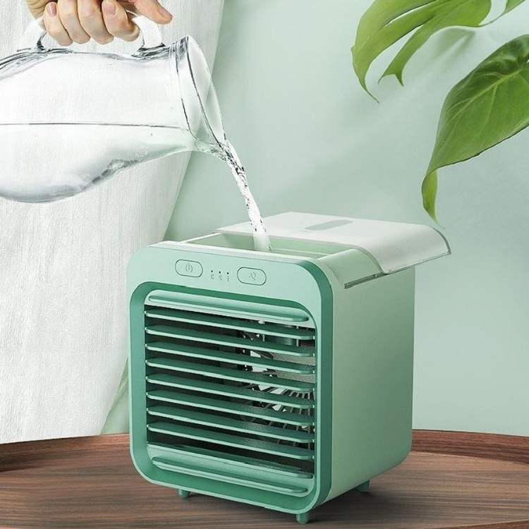Efficient compact air conditioner for desktop or bedside, offering quiet cooling and comfort.