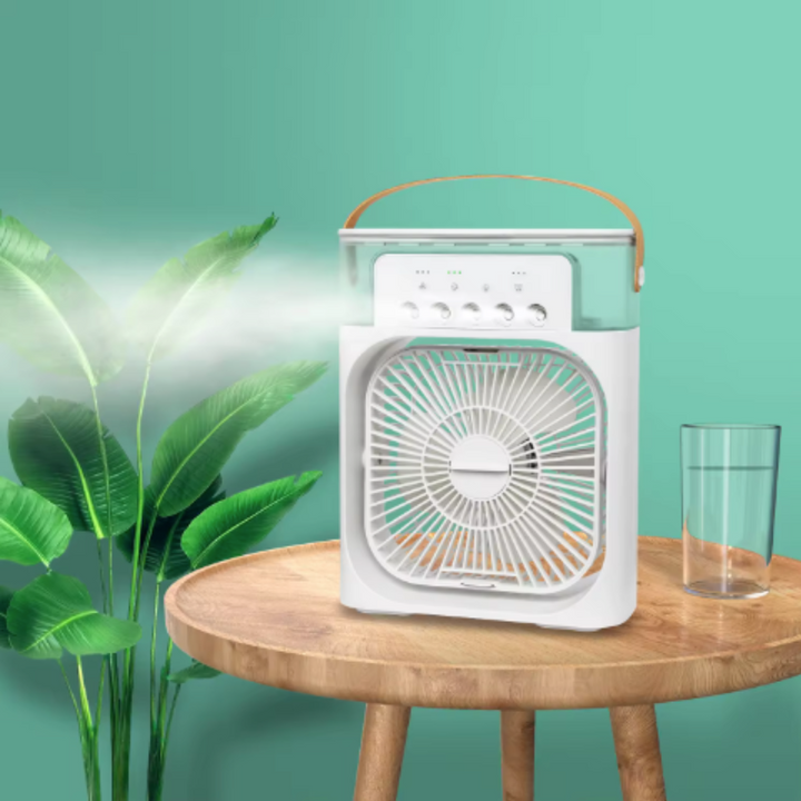 Compact portable air cooler & humidifier, perfect for desktop or small room comfort. USB-powered personal cooling fan.