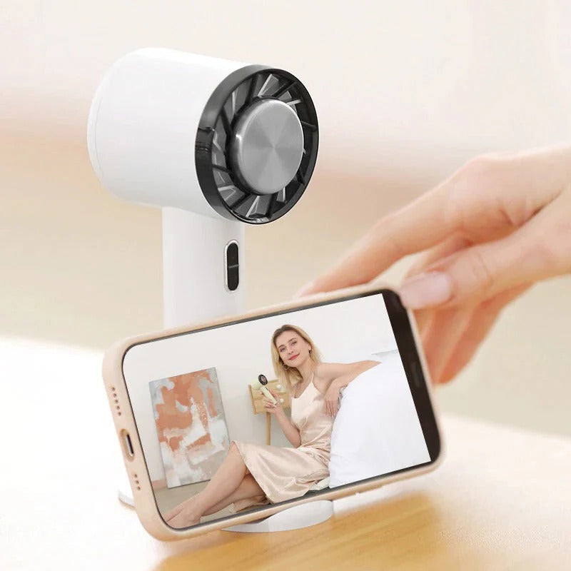 Personal cooling fan for desk, office, and outdoor activities; rechargeable and travel-friendly.