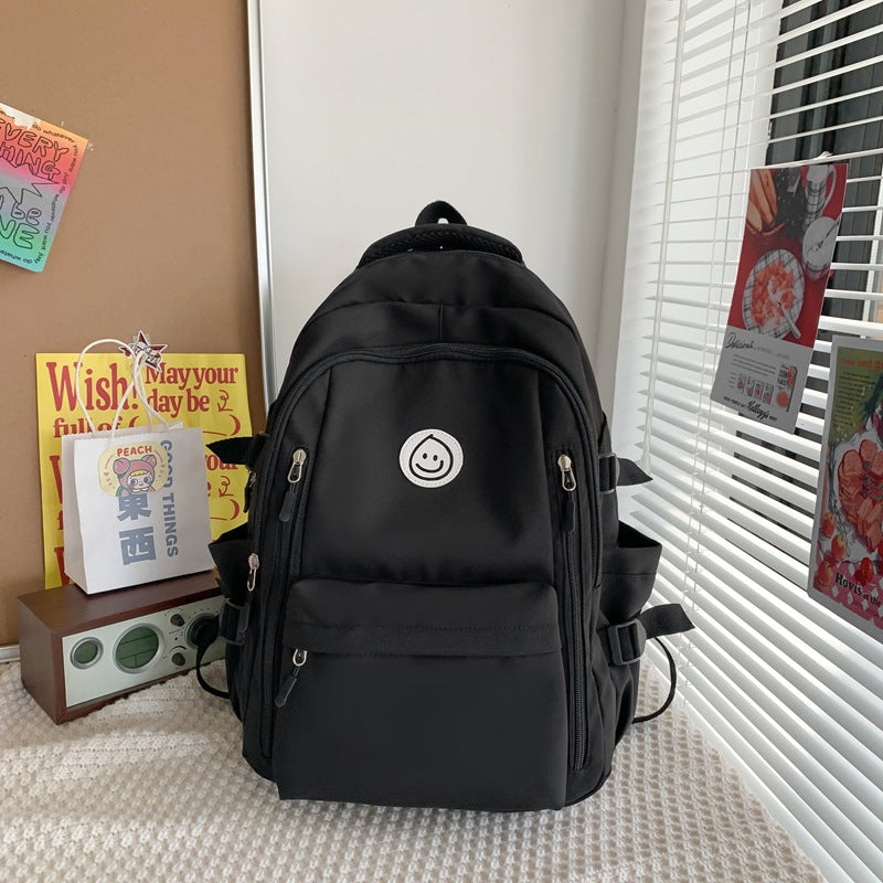Lightweight compact backpack for students & daily commuters, featuring durable design & ample storage.