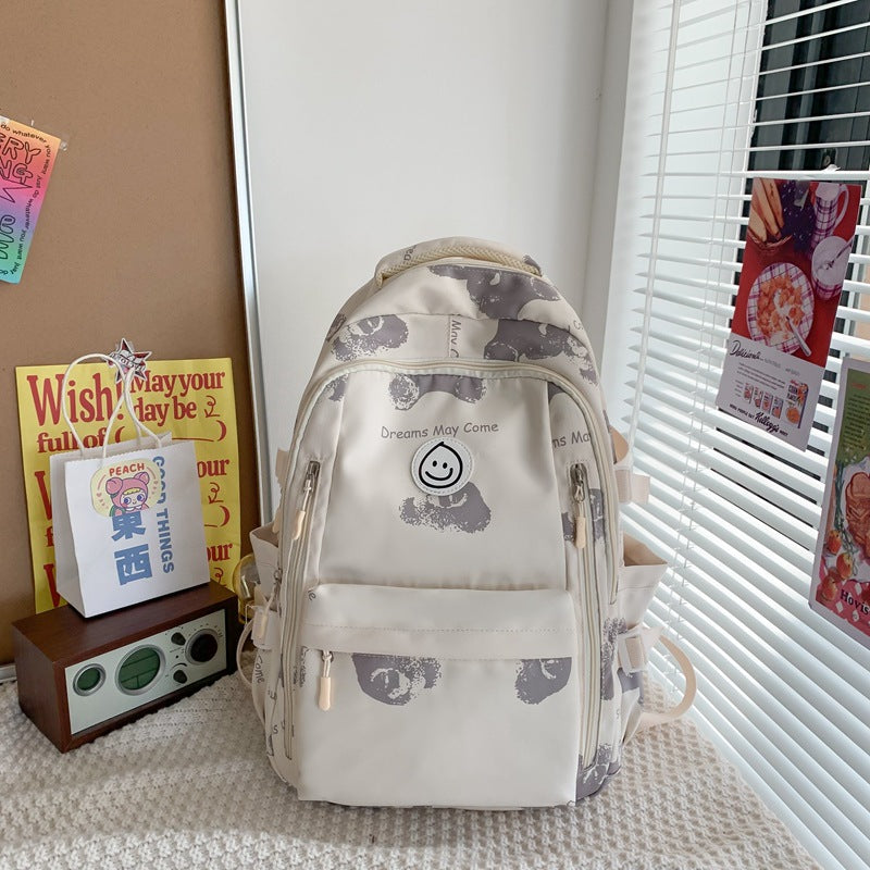 Durable unisex compact backpack, versatile for daily use, school, travel, and casual adventures.