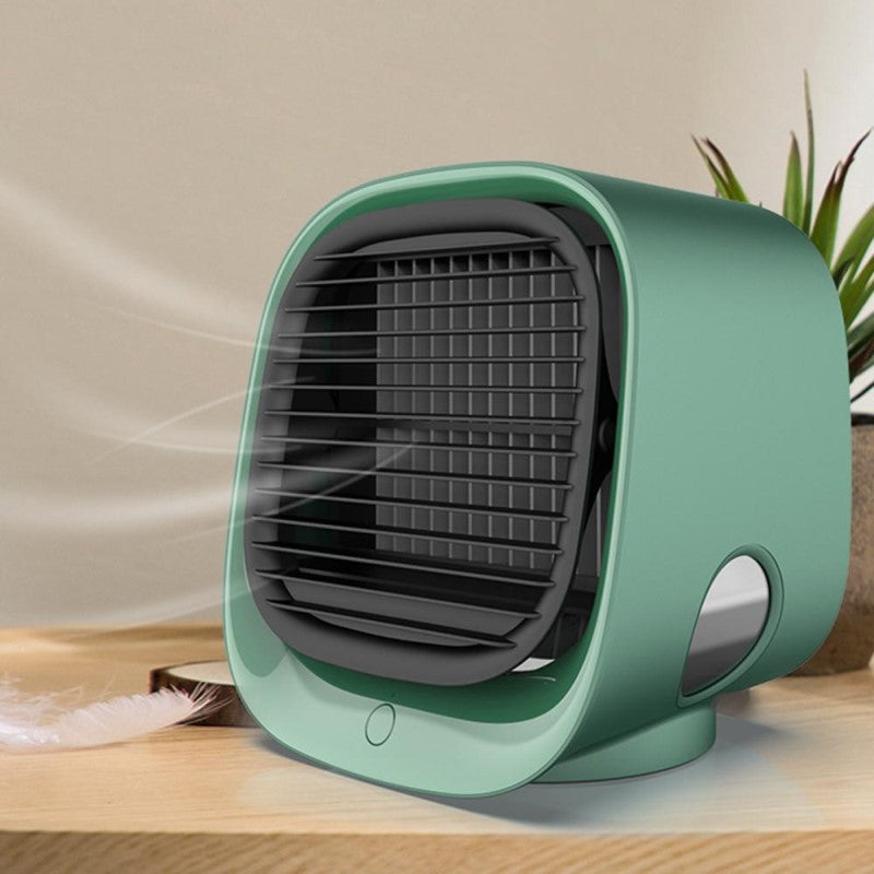 Sleek compact USB air cooler & humidifier. Quiet personal fan for desktop, offering cool, humidified air.