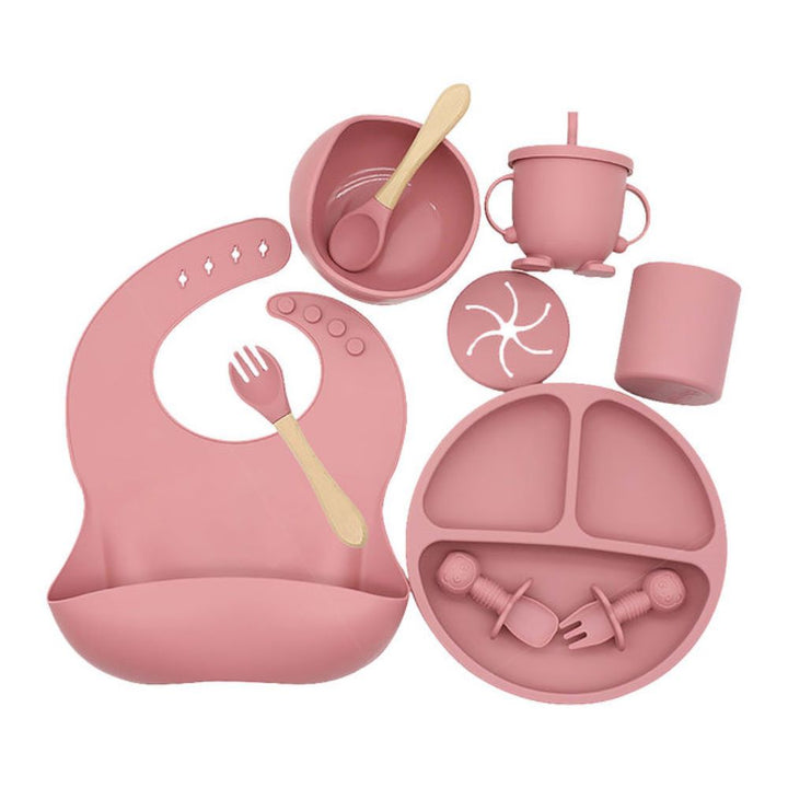 Complete unisex baby silicone feeding set with strong suction plate, bowl, bib & utensils for easy weaning.