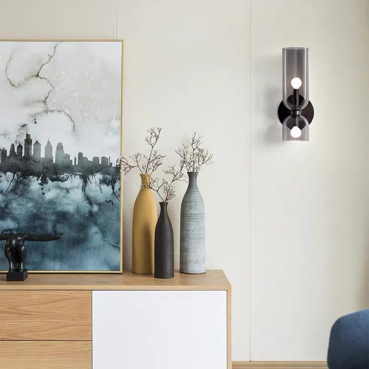 Chic glass twin wall lamp, a sleek modern lighting piece for contemporary interiors & home styling.