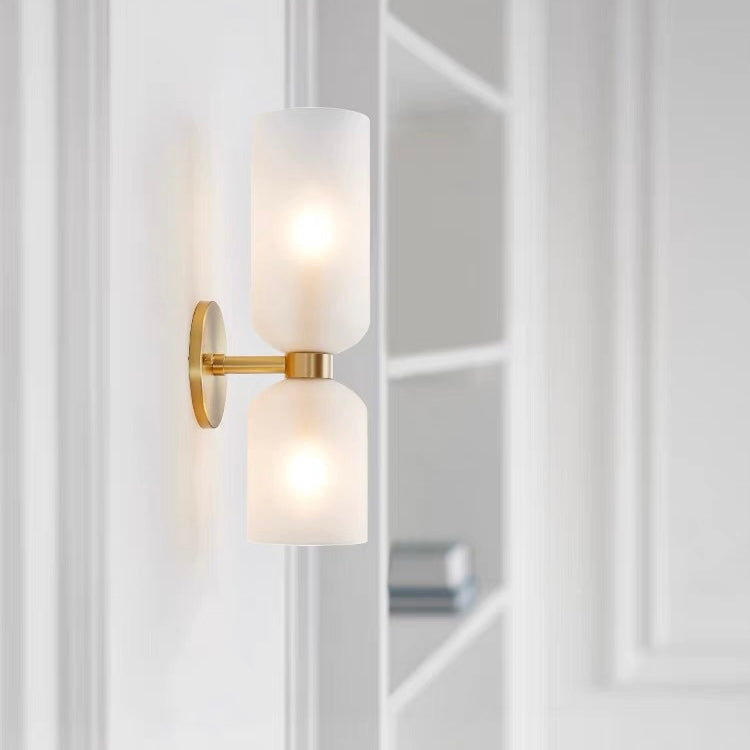 Elegant twin wall lamp with clear glass, perfect modern lighting for contemporary living spaces.