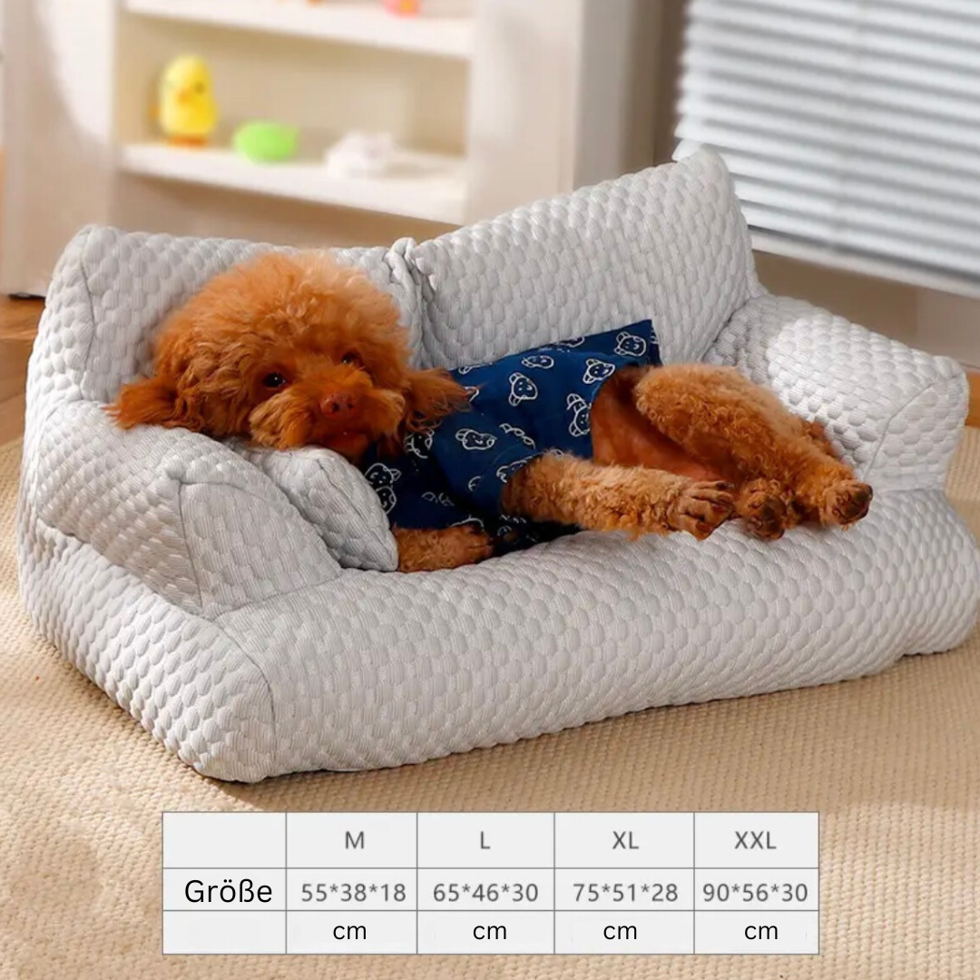 Stylish gray cooling dog sofa bed with bolstered edges & washable cover, perfect pet furniture for relaxation.