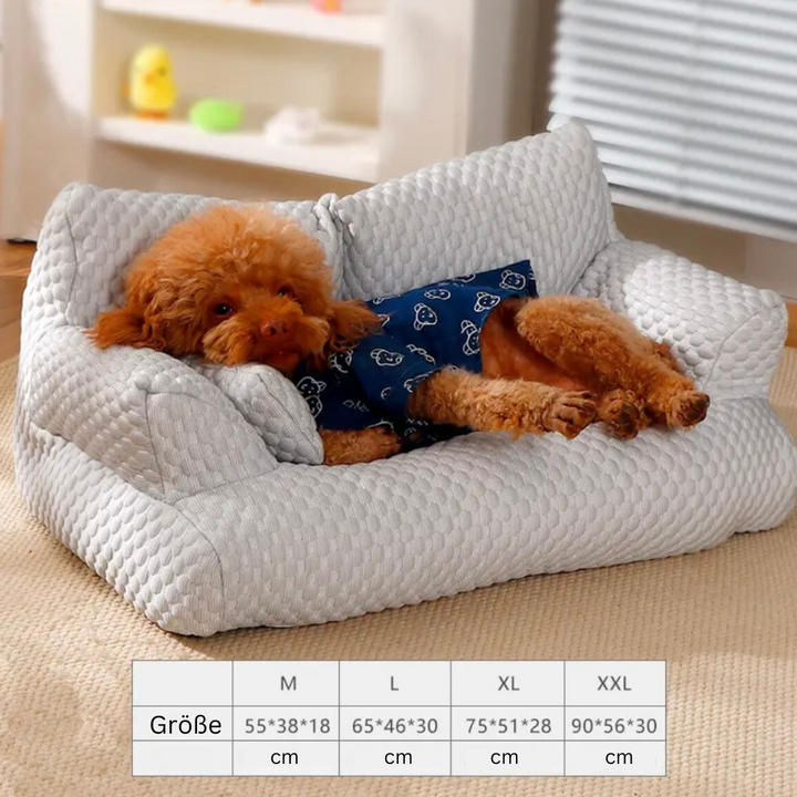 Stylish gray cooling dog sofa bed with bolstered edges & washable cover, perfect pet furniture for relaxation.