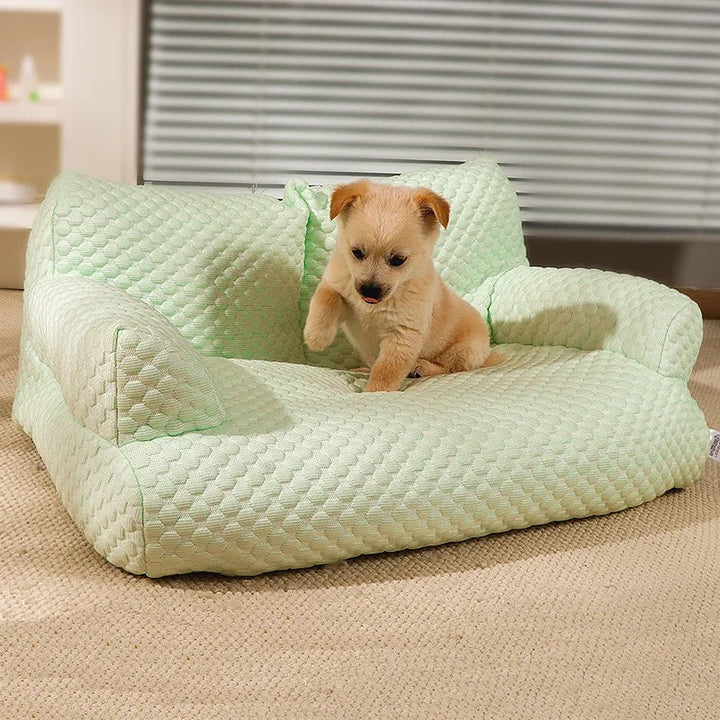 Washable cooling dog bed sofa with breathable fabric, easy to clean & provides cool comfort for your pet.