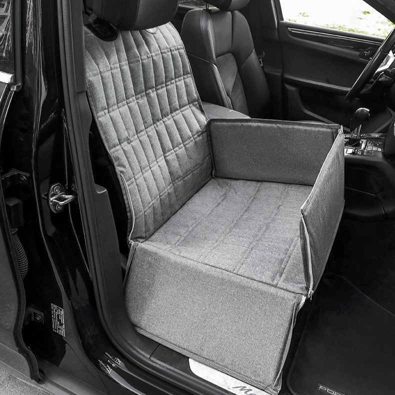 Versatile dog car travel basket with secure attachments & soft padding, ensuring a safe & comfy ride.