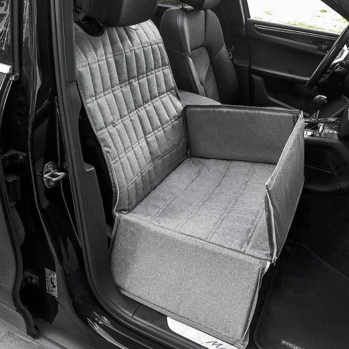 Versatile dog car travel basket with secure attachments & soft padding, ensuring a safe & comfy ride.