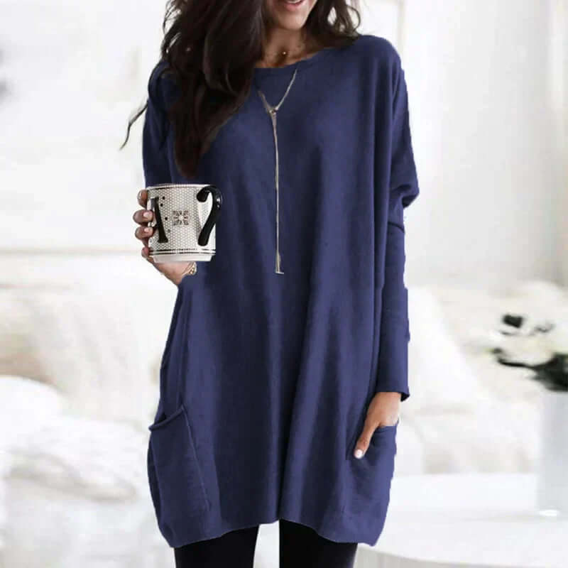 Long sleeve women's oversized tunic sweater, offering effortless style and warmth.
