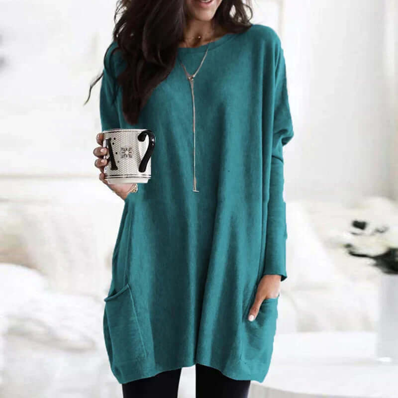Soft women's oversized tunic sweater, designed for ultimate comfort and relaxed fit.