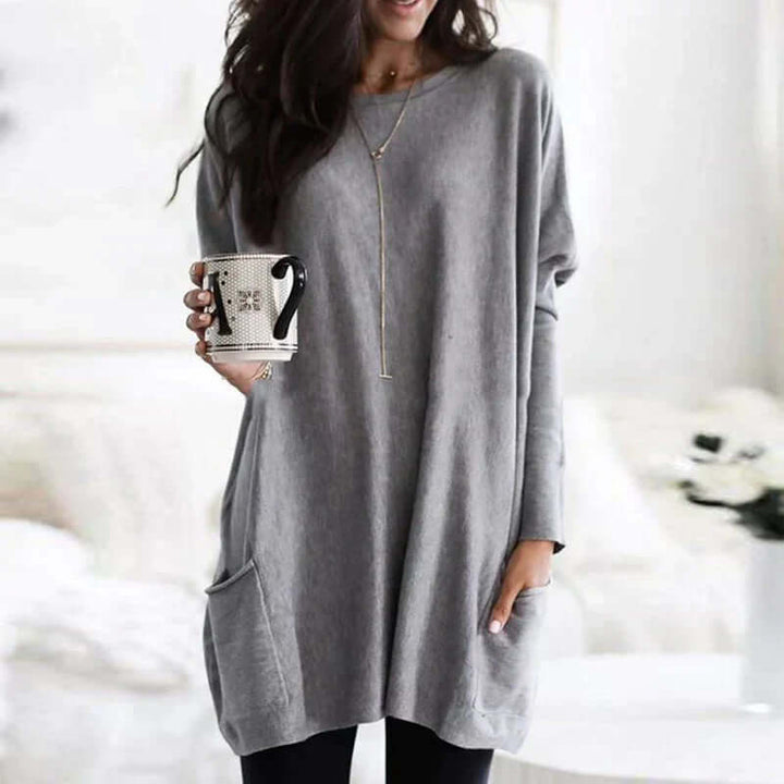 Chic oversized tunic sweater for women, a cozy essential for fall and winter fashion.