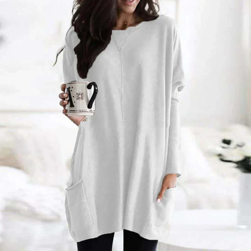 Cozy women's oversized long sleeve tunic sweater, perfect for chilly days and casual elegance.