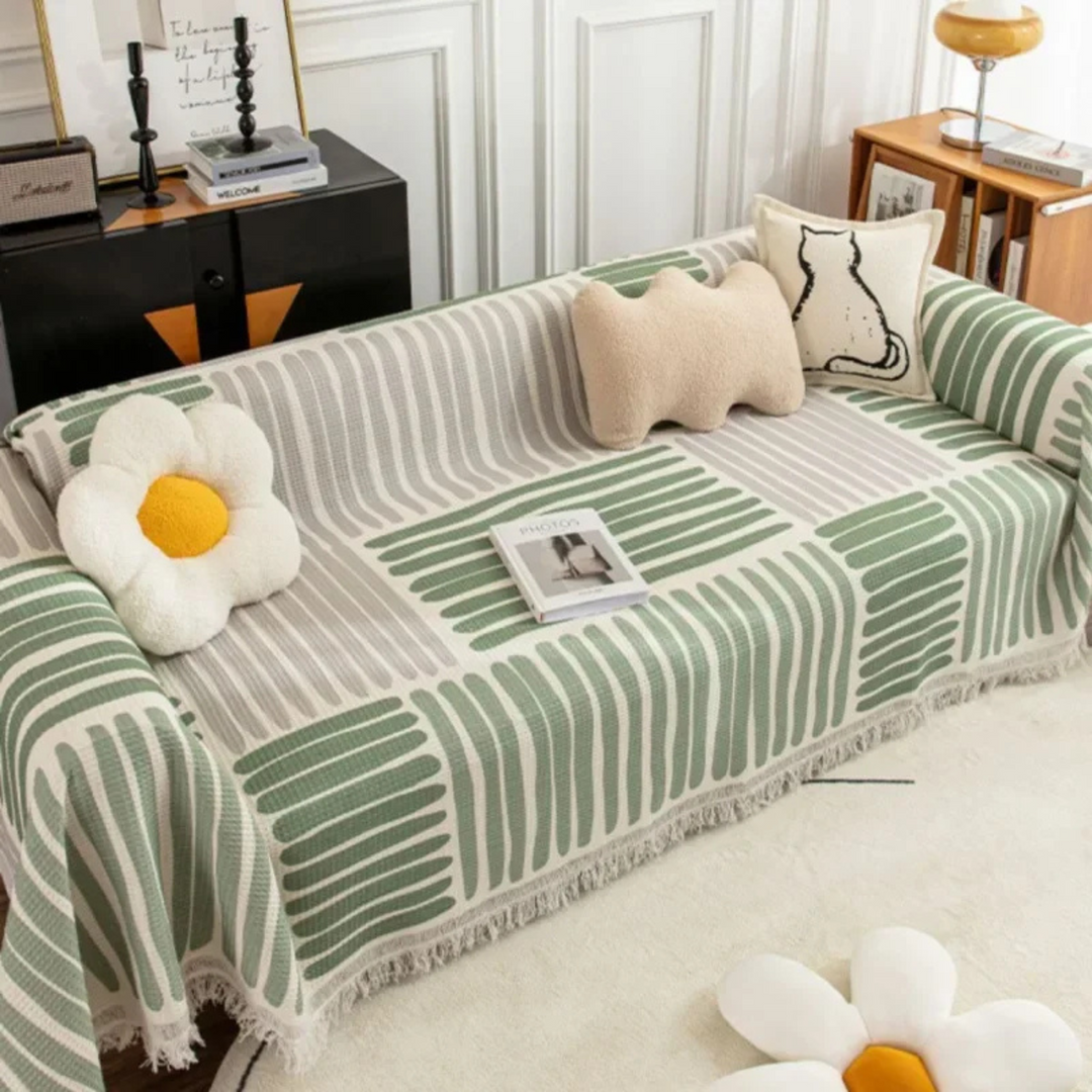 Chic Scandinavian tassel throw blanket, a cozy accent piece for sofas, enhancing living room Nordic style.