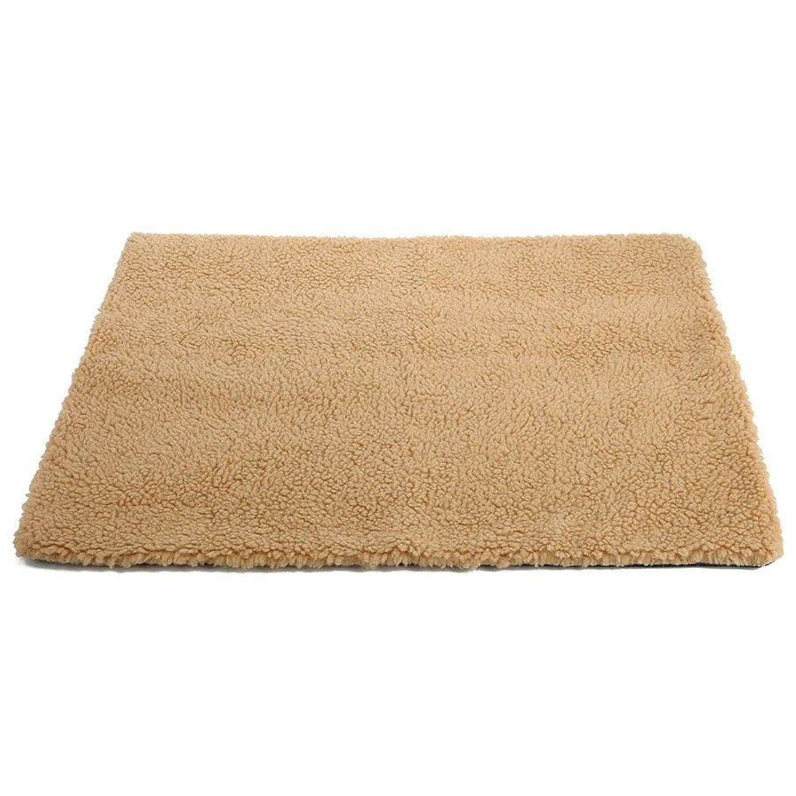 Portable self-heating pet mat/bed for cats & dogs. Provides cozy warmth & comfort without electricity. Great for travel.