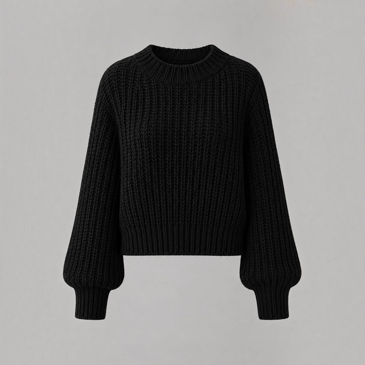 Cozy women's knit cardigan in a thick, warm design for winter outerwear.