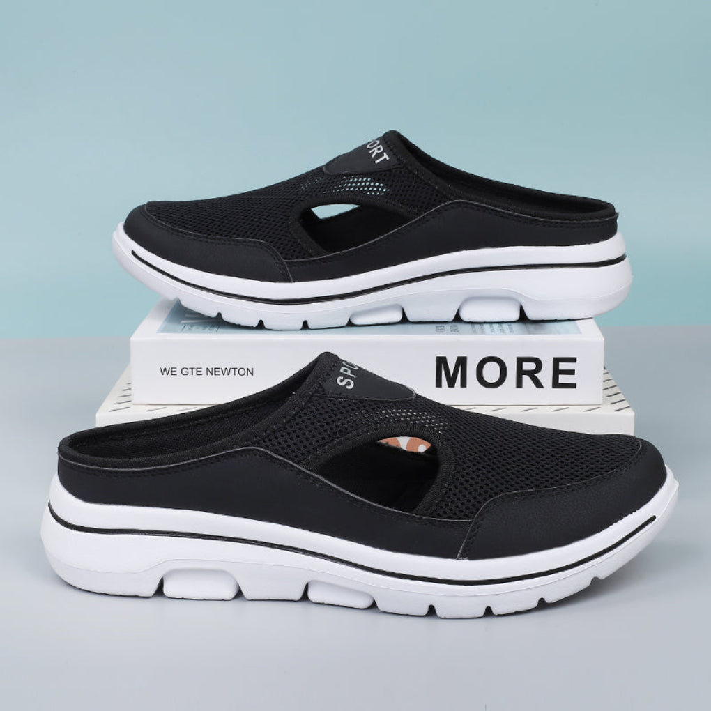 Casual slip-on orthopedic slippers in a home setting, emphasizing arch support and foot comfort for all.
