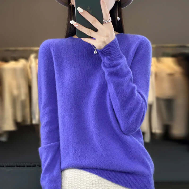 Simple O-neck women's knit jumper, a warm and stylish pullover for casual winter wear.