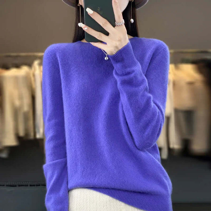 Simple O-neck women's knit jumper, a warm and stylish pullover for casual winter wear.