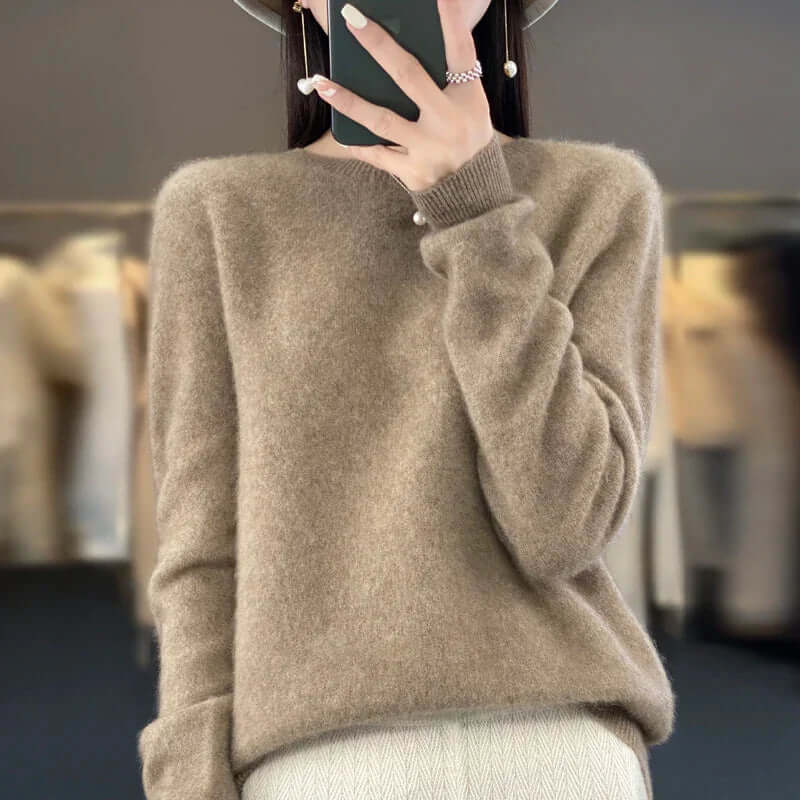 Soft knit O-neck women's jumper, a cozy long-sleeve pullover sweater for warmth & style.