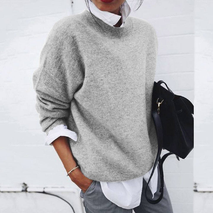 Comfortable women's mock neck long sleeve oversized sweater. Relaxed fit jumper for everyday cozy style.
