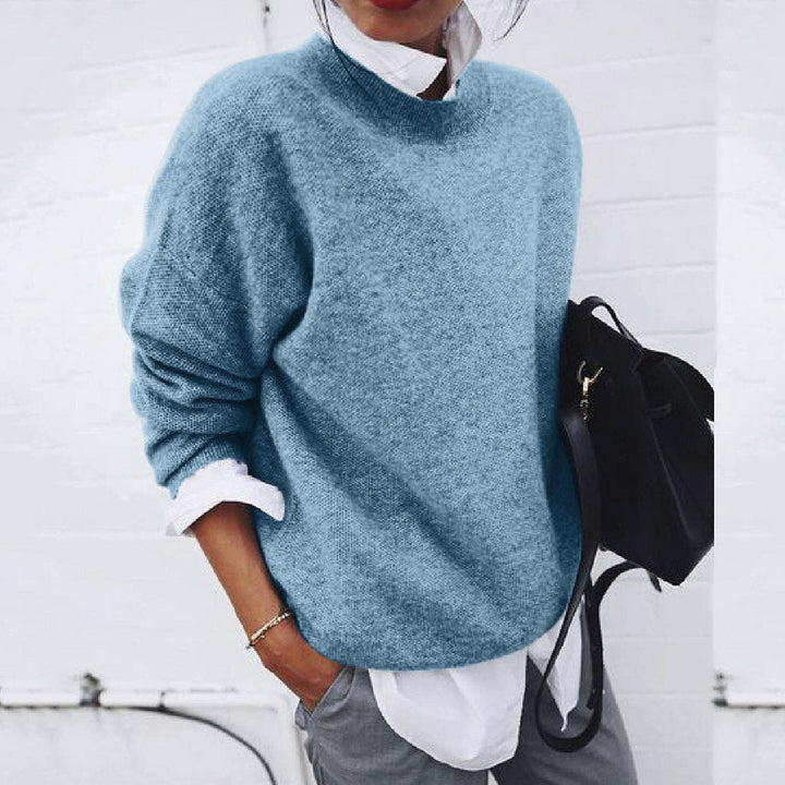 Women's oversized mock neck long sleeve sweater. Casual, cozy jumper for comfortable everyday fall & winter fashion.