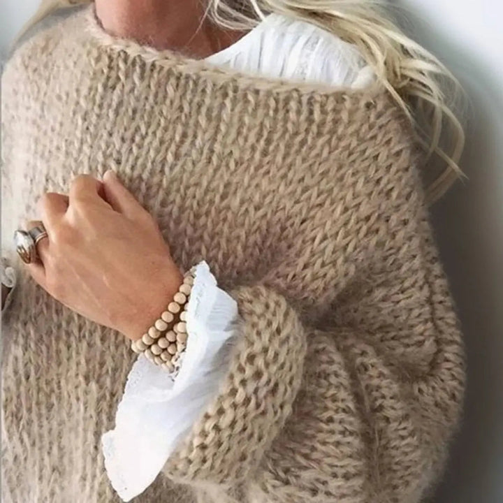 Warm women's mohair blend oversized knit jumper, a cozy fashion essential for cold winter days.