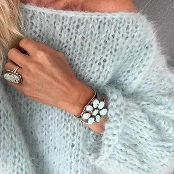 Round neck, long sleeve women's oversized mohair blend sweater, a versatile and cozy casual winter knit.