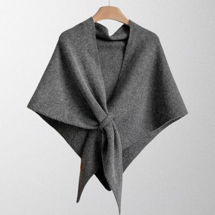 Chic women's fashion scarf, a soft autumn wrap providing cozy comfort and an elegant look.