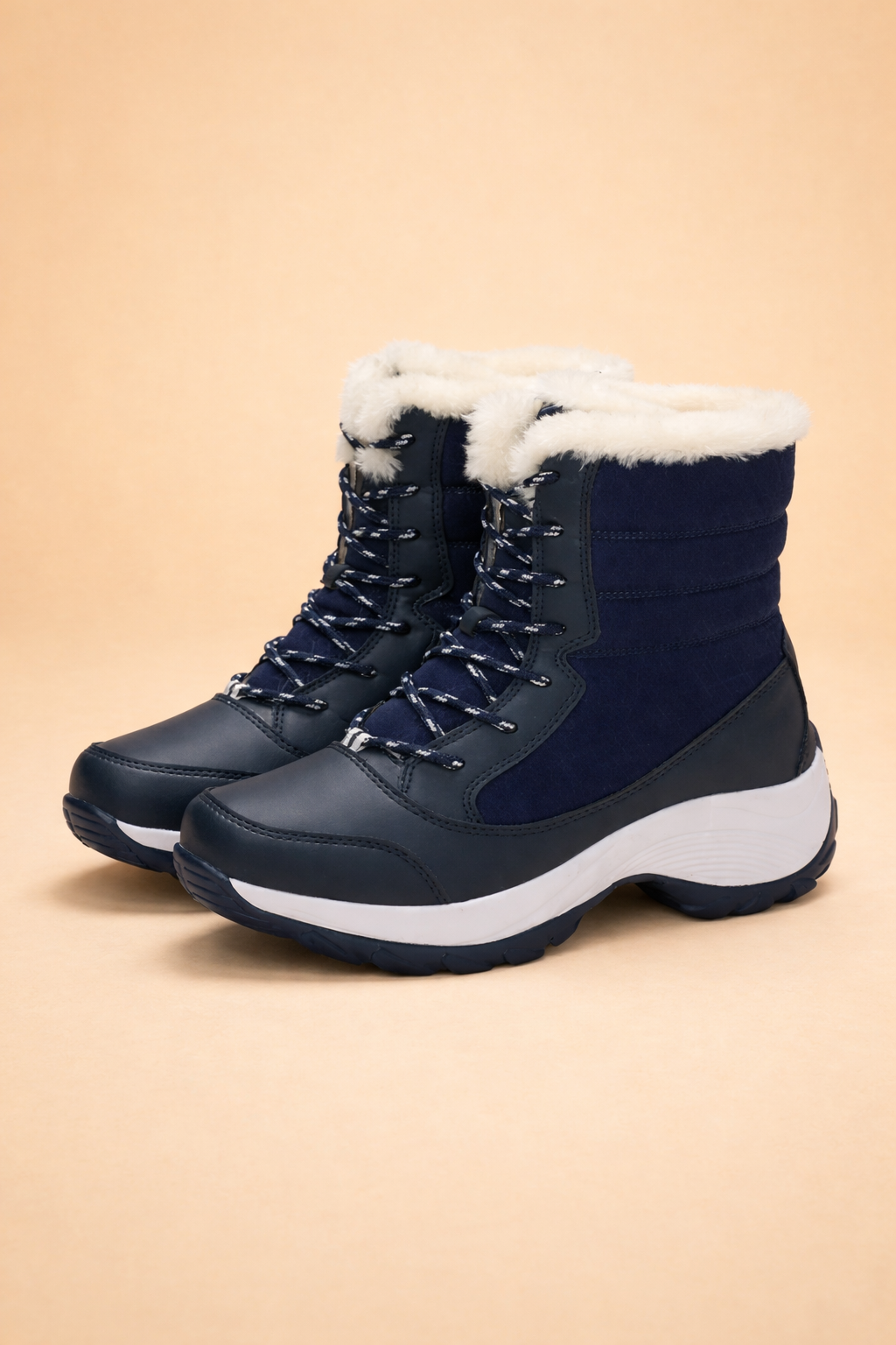 Warm women's ankle boots with a comfortable platform sole. Elegant and cozy for cold weather fashion.