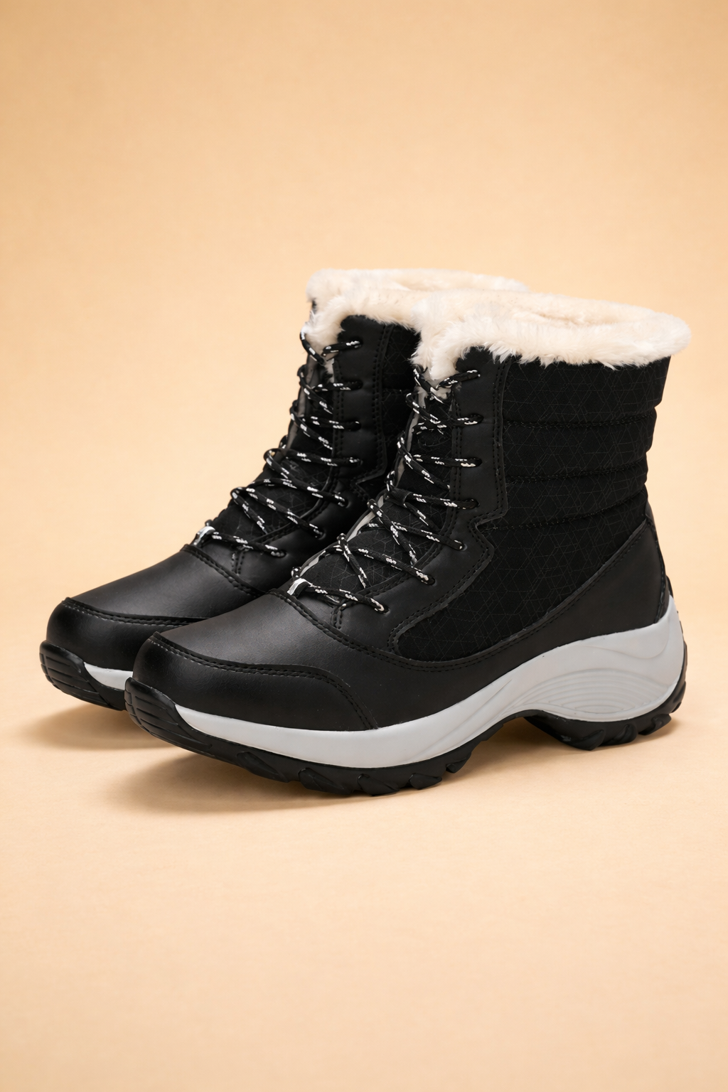 Fashionable women's winter platform boots in a neutral color, designed for warmth and style on snow.