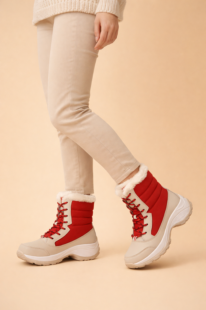 Elegant women's winter platform boots with a sleek design. Perfect stylish footwear for snowy days.