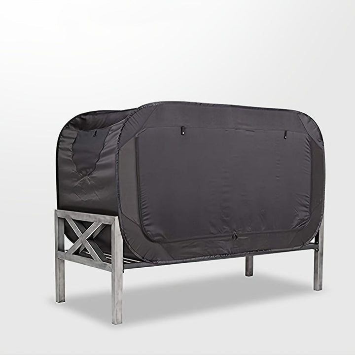 Easy-setup portable tent bed, providing a comfortable sleep space anywhere, for indoor or outdoor use.