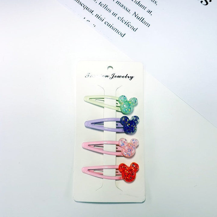 Vibrant plastic hair clips with cute animal, fruit & Mickey designs for girls' playful styling.