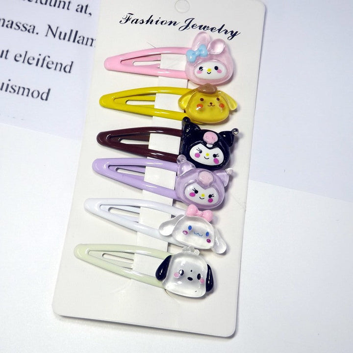Assorted cute animal & fruit plastic hair clips; playful accessories for girls & women.